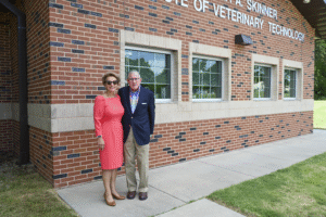 Joan Martin and Jeff Barbour in front of Veterinary Building at Gaston College.